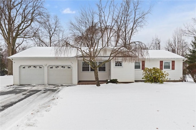 single story home featuring a garage