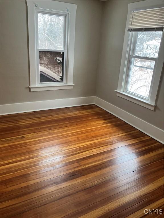 empty room featuring hardwood / wood-style flooring