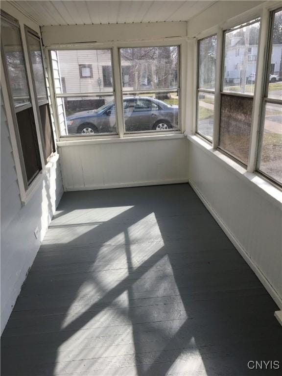 sunroom with wooden ceiling