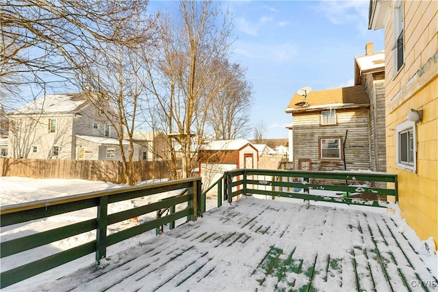 view of snow covered deck