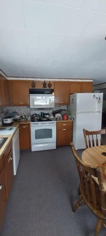 kitchen featuring white appliances