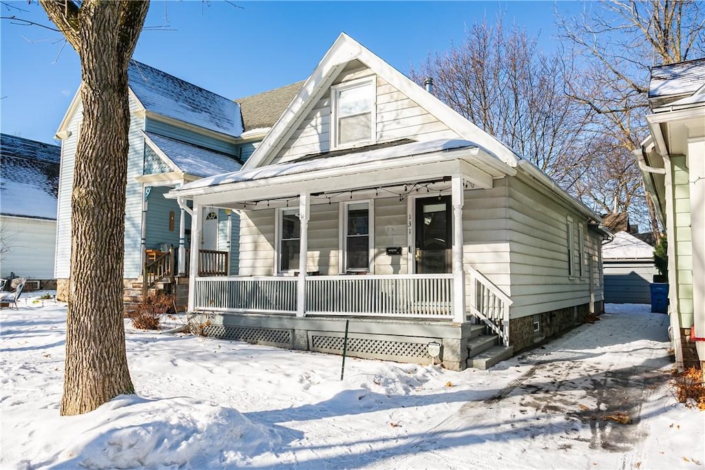 bungalow-style home featuring covered porch