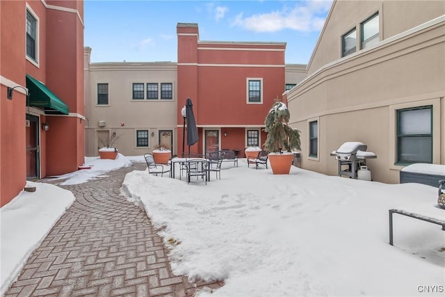 view of snow covered house