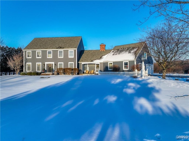 view of snow covered property