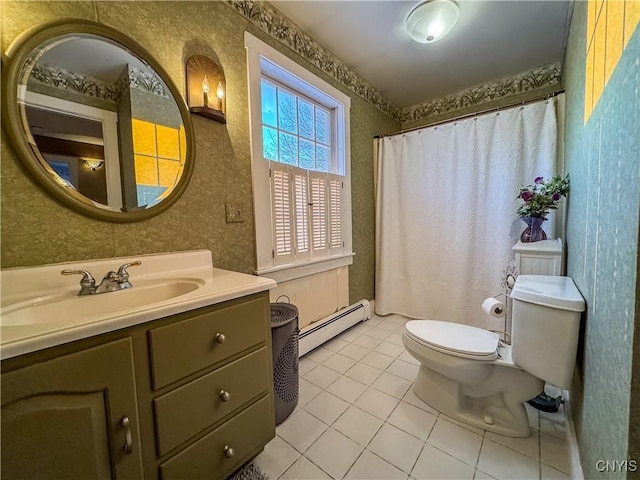 bathroom with tile patterned floors, toilet, baseboard heating, vanity, and curtained shower