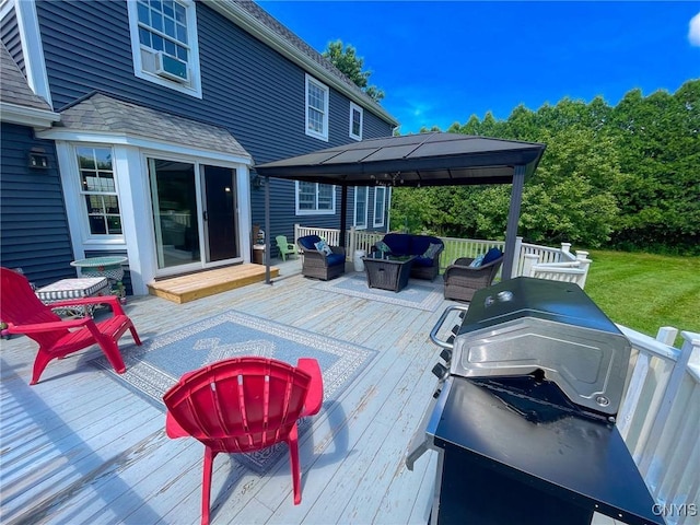 deck featuring a gazebo and outdoor lounge area