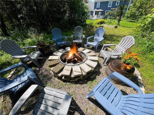 view of patio / terrace with an outdoor fire pit