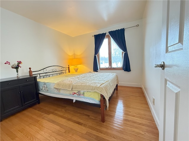 bedroom with light hardwood / wood-style floors