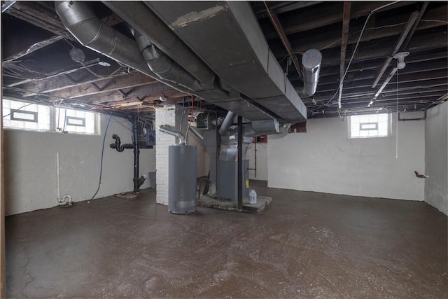 basement with heating unit and gas water heater