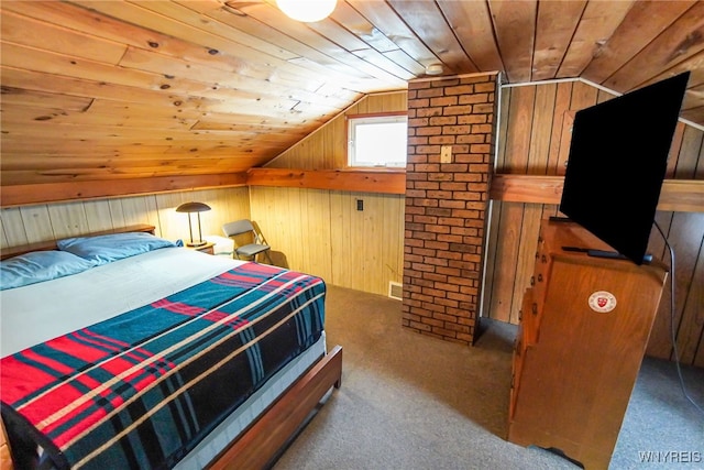 bedroom with vaulted ceiling, carpet floors, wooden ceiling, and wood walls