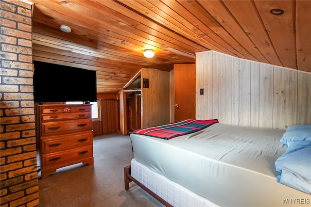 bedroom with vaulted ceiling, wooden ceiling, and wooden walls