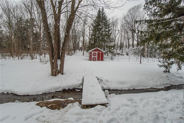 view of yard covered in snow