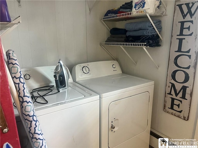 laundry room featuring washer and clothes dryer