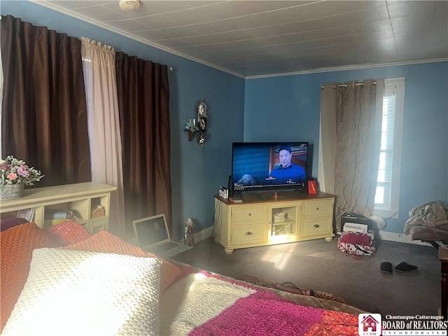 bedroom featuring crown molding and carpet floors