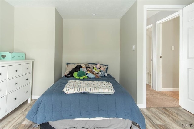 bedroom featuring light hardwood / wood-style flooring