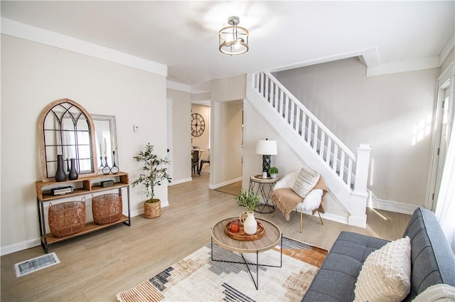 living room with light hardwood / wood-style floors