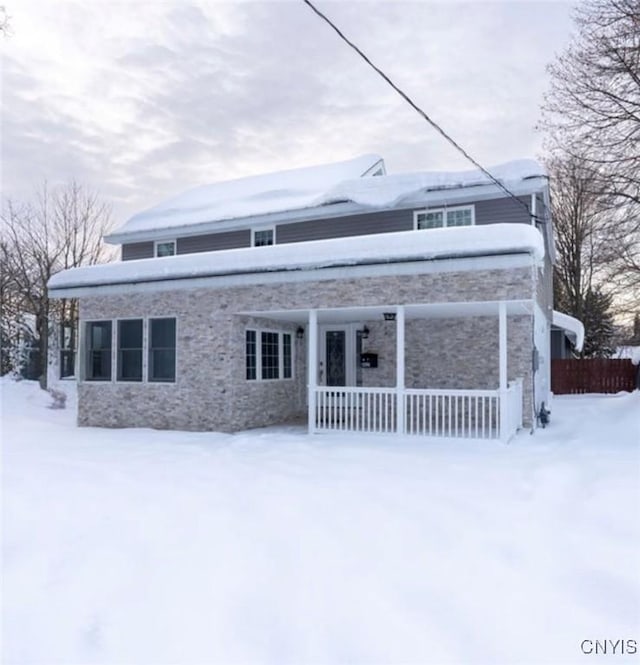 807 Utica Rd, Utica, NY 13502 - front facade featuring a porch