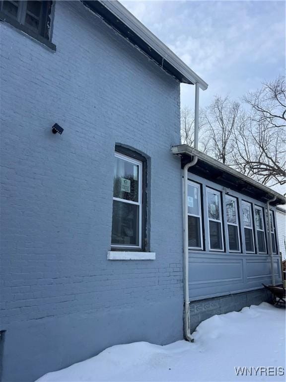 view of snow covered property