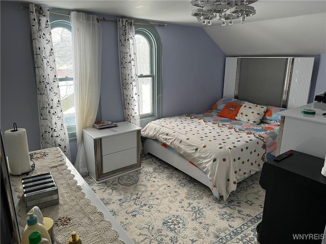 bedroom with vaulted ceiling