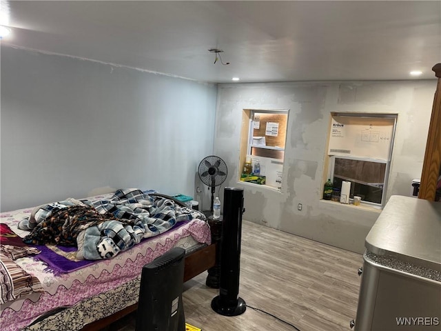 bedroom featuring light wood-type flooring