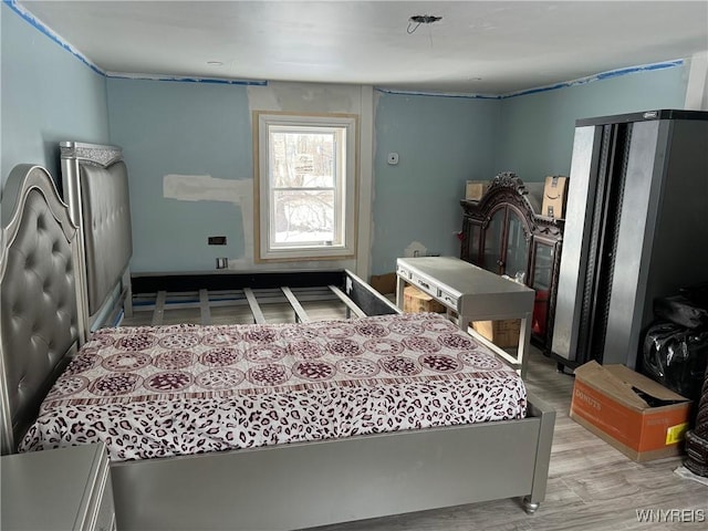 bedroom featuring light hardwood / wood-style flooring