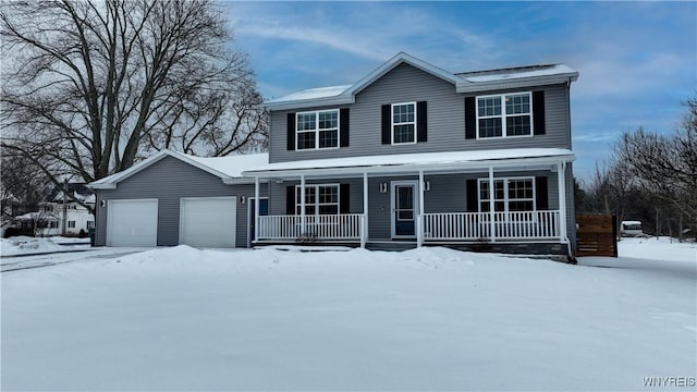 view of front of house with covered porch and a garage