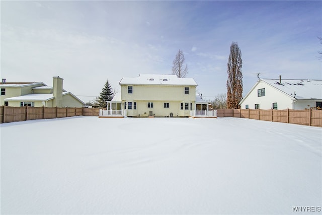 view of snow covered property