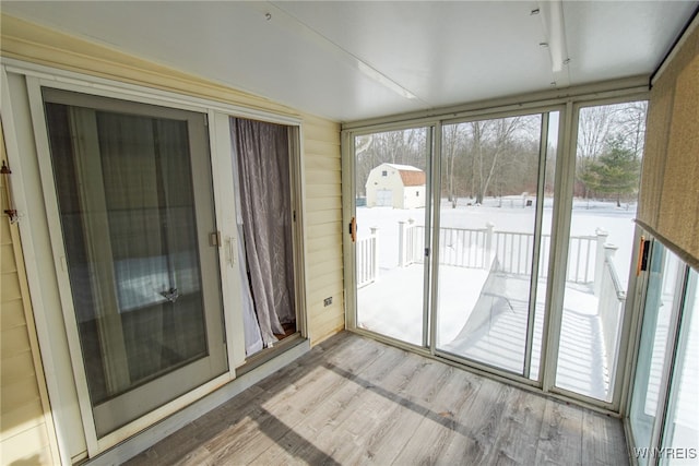 view of unfurnished sunroom