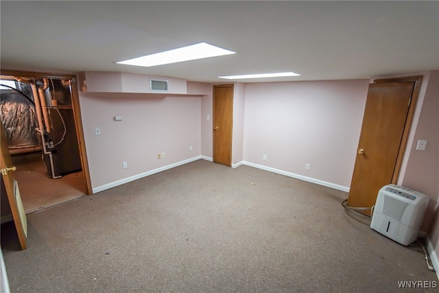 basement featuring carpet flooring