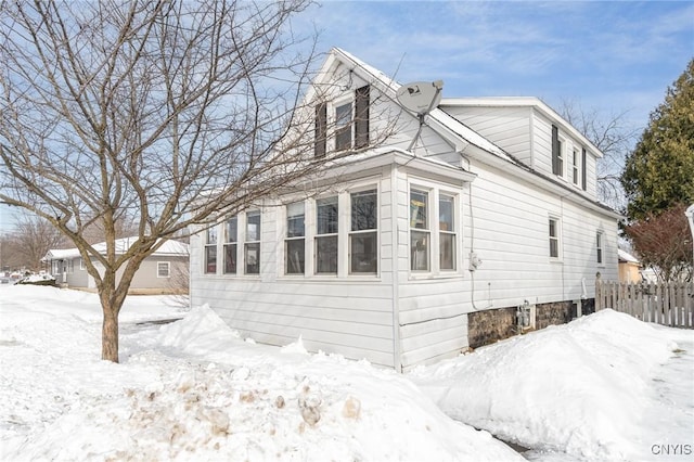 view of snow covered property