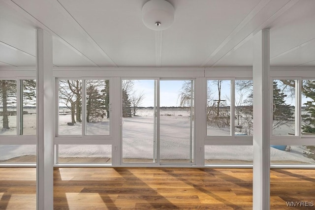 2202 River Rd, Wheatfield, NY 14304 - unfurnished sunroom featuring wood finished floors