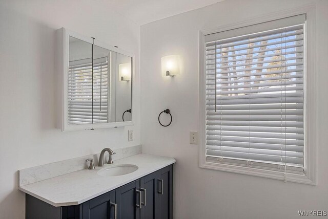 2202 River Rd, Wheatfield, NY 14304 - bathroom with plenty of natural light and vanity