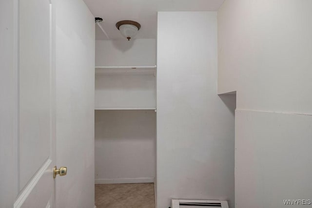 2202 River Rd, Wheatfield, NY 14304 - spacious closet featuring baseboard heating