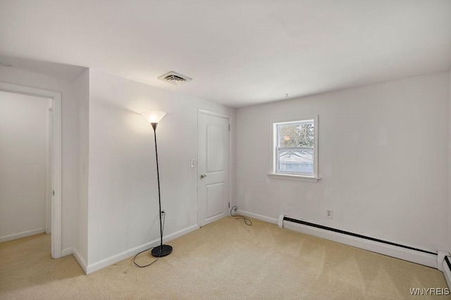 2202 River Rd, Wheatfield, NY 14304 - carpeted spare room with a baseboard heating unit and baseboards