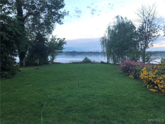 2202 River Rd, Wheatfield, NY 14304 - view of green lawn with a water view