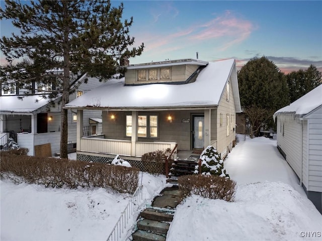 bungalow-style home with a porch