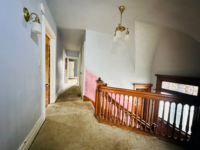 hallway featuring carpet