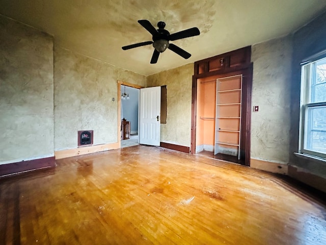 interior space with hardwood / wood-style flooring and ceiling fan