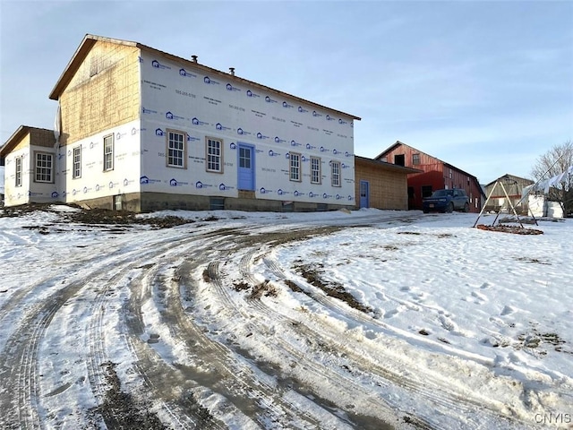 view of snow covered property