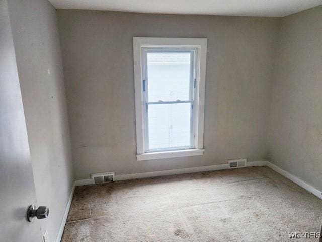 17 Beattie Ave, Lockport-City, NY 14094 - empty room with carpet, visible vents, and baseboards