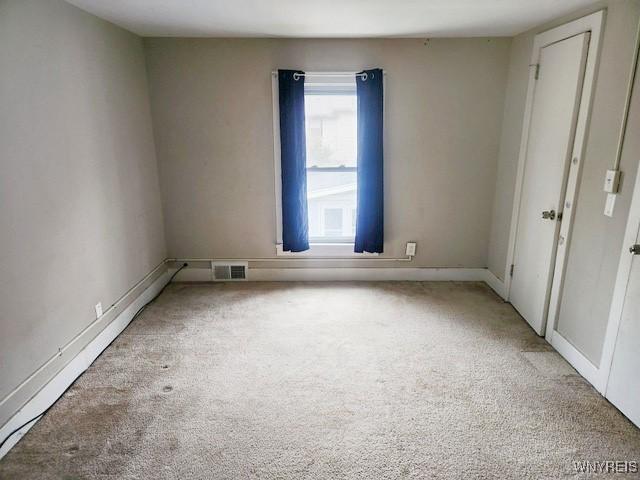 17 Beattie Ave, Lockport-City, NY 14094 - carpeted empty room featuring visible vents