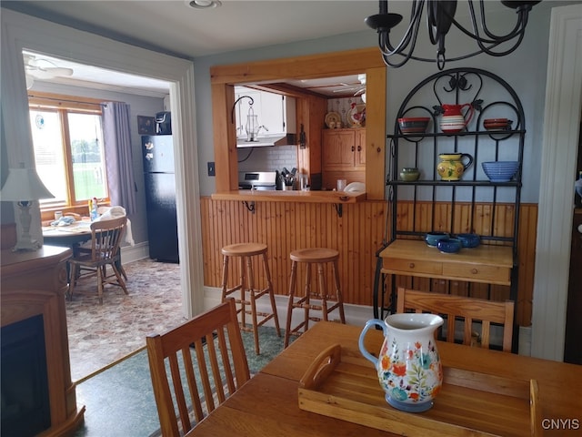 dining area featuring a chandelier