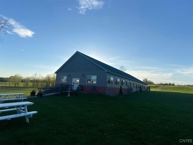 exterior space featuring a lawn