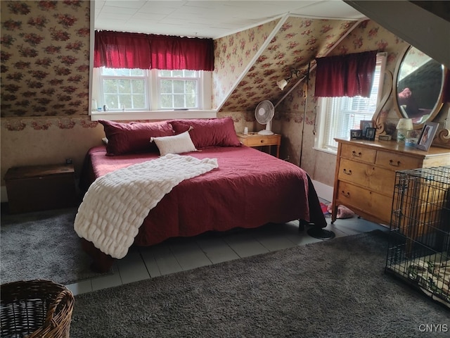 bedroom featuring multiple windows and tile patterned floors