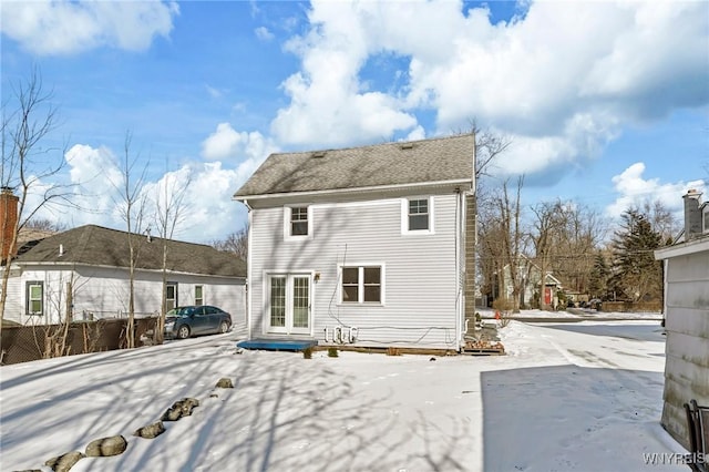 view of snow covered house