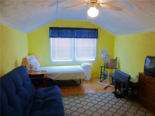 bedroom with ceiling fan and lofted ceiling