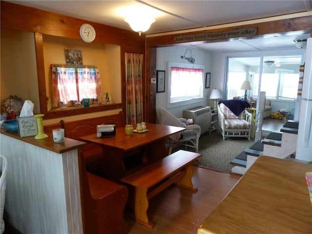 dining room with hardwood / wood-style flooring