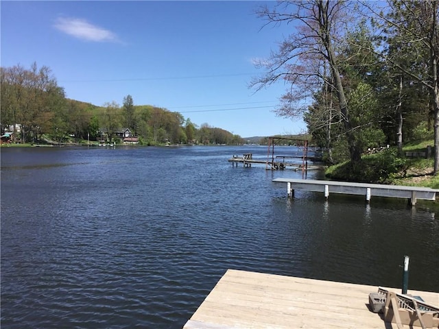 3049 Huggins Rd, Orange, NY 14815 - dock area featuring a water view