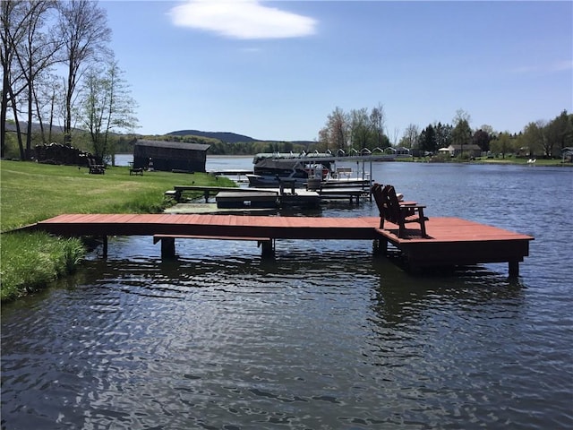 3049 Huggins Rd, Orange, NY 14815 - dock featuring a water view and a lawn