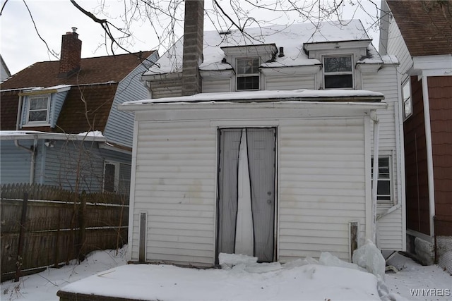 view of snow covered property